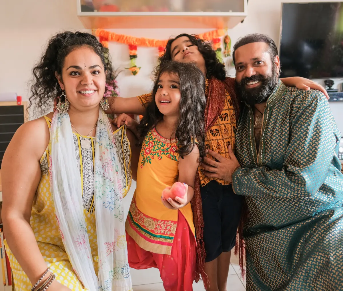 Happy family in traditional clothing